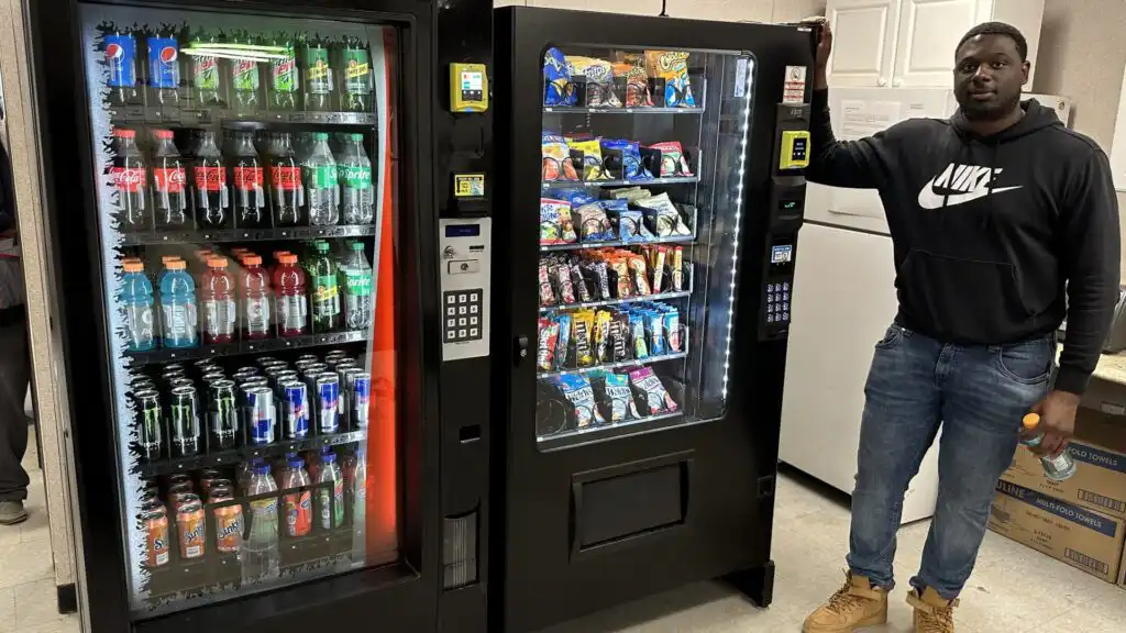 Vending machine setup by Mastuhree Brand showcasing premium product placement and business consultation success.