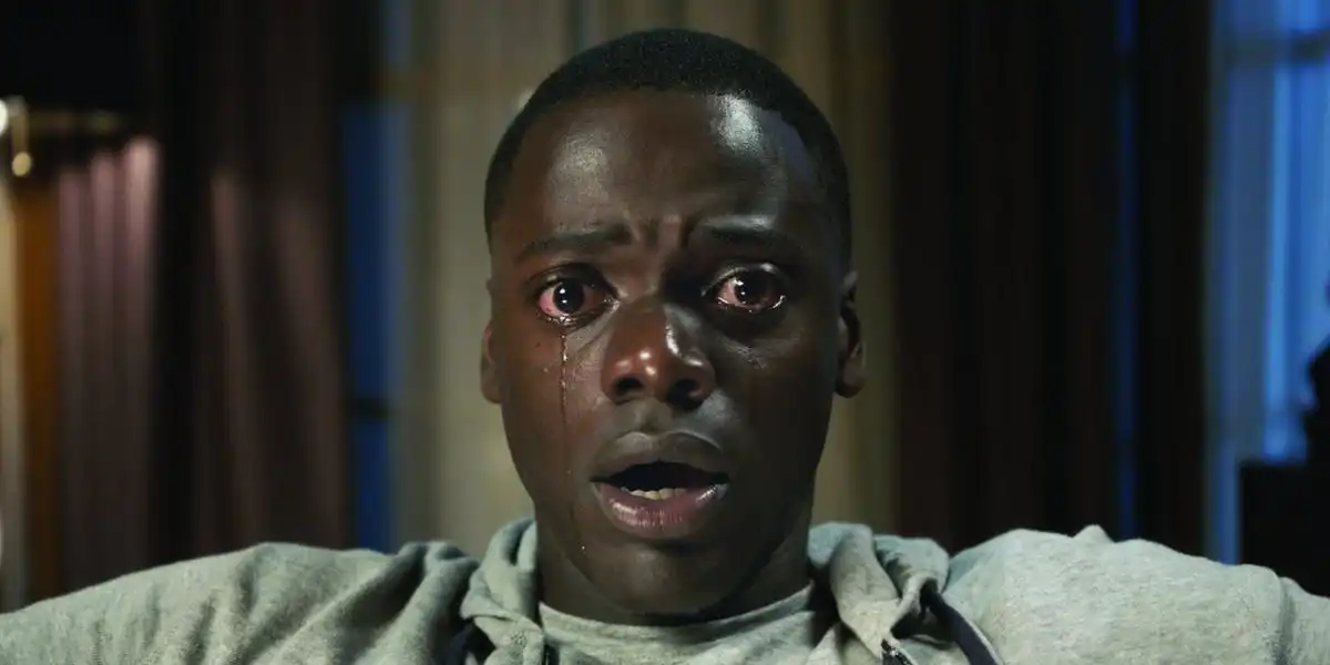 Person experiencing a nightmare, reflecting hidden meanings behind common scary dreams.