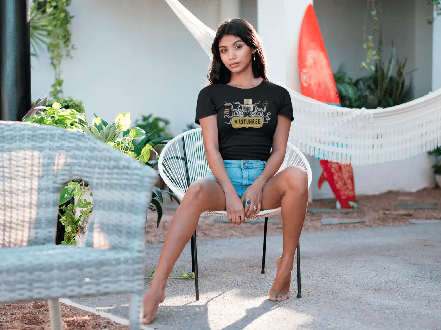 Streetwear graphic t-shirt features a bold octopus wearing a gold top hat.