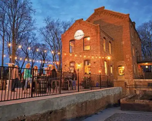Weldon Mills Distillery at sunset with bourbon tasting flight by the Roanoke River in Weldon NC
