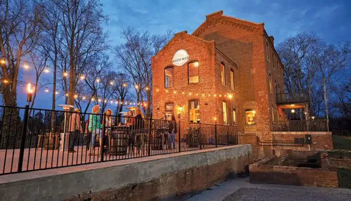 Weldon Mills Distillery at sunset with bourbon tasting flight by the Roanoke River in Weldon NC