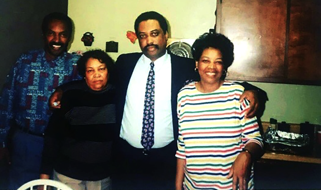 A vintage photo shows a woman who fought ovarian cancer. She is with her two brothers and sisters. This image represents family strength and support before and during her journey with cancer.
