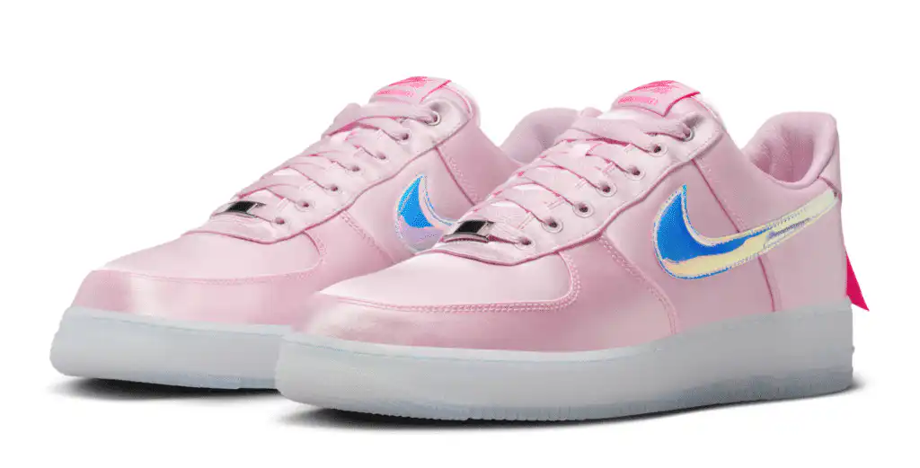Pink Nike Air Force 1 Breast Cancer Awareness Low with satin upper, iridescent Swoosh, and pink ribbon heel design.