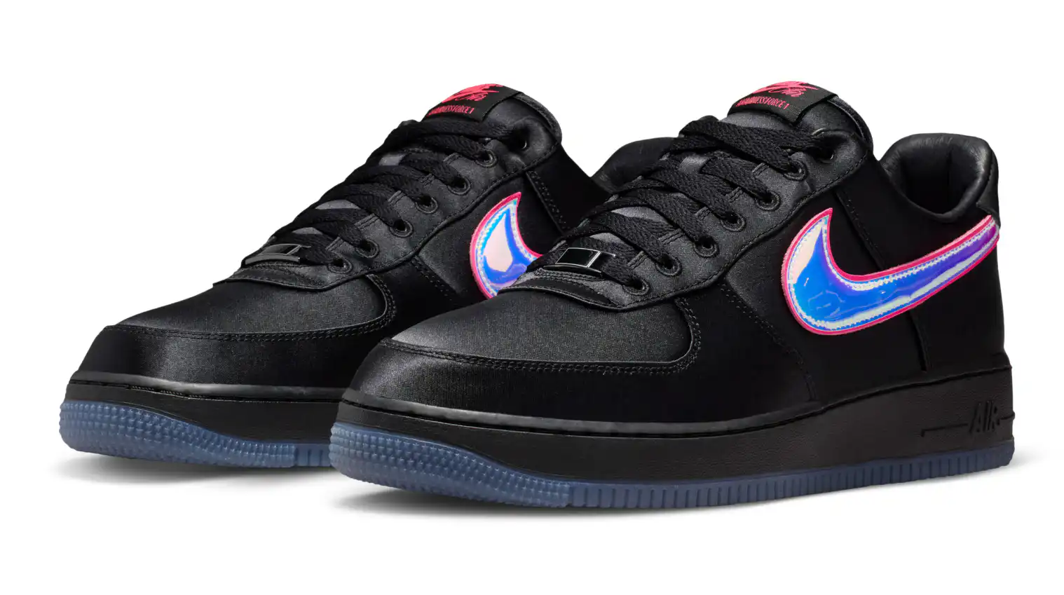 Black Nike Air Force 1 Breast Cancer Awareness Low featuring satin upper, iridescent Nike Swoosh, and Aw’Air’ness outsole detail.