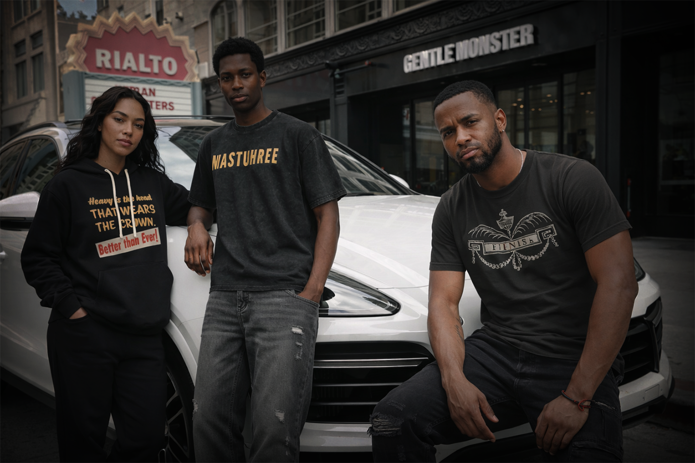 Three models wearing Mastuhree premium streetwear lean against a white Porsche Cayenne on Cary Street in Richmond Virginia, showcasing modern luxury urban fashion.