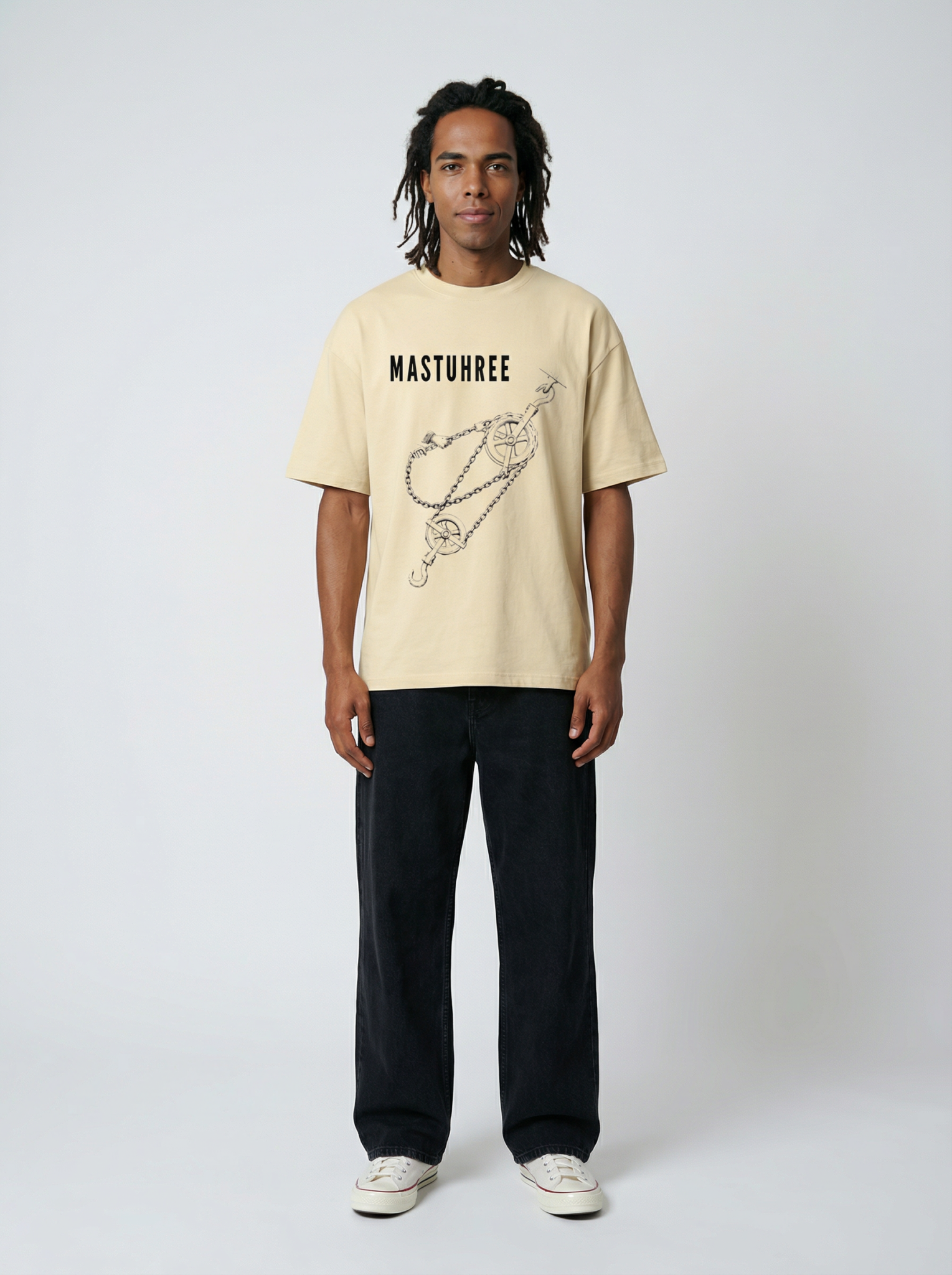 Front view of a young man wearing the Chain Reaction Mastuhree t-shirt, featuring bold graphic design, premium cotton fabric, and modern streetwear style.