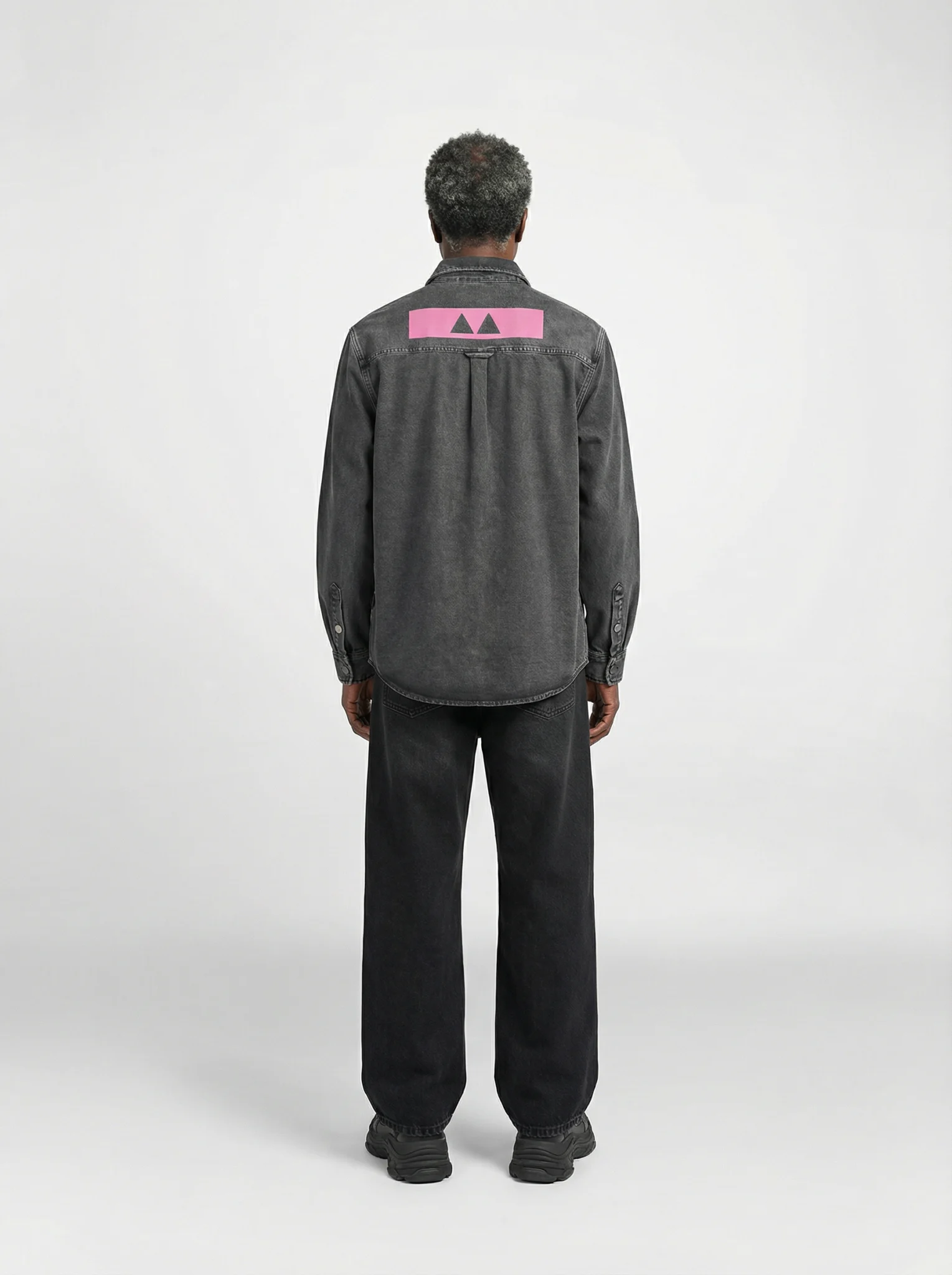 Rear view of a male model wearing the Dark Grey City-Street Shacket by Mastuhree, featuring structured tailoring, premium fabric, and modern streetwear style.