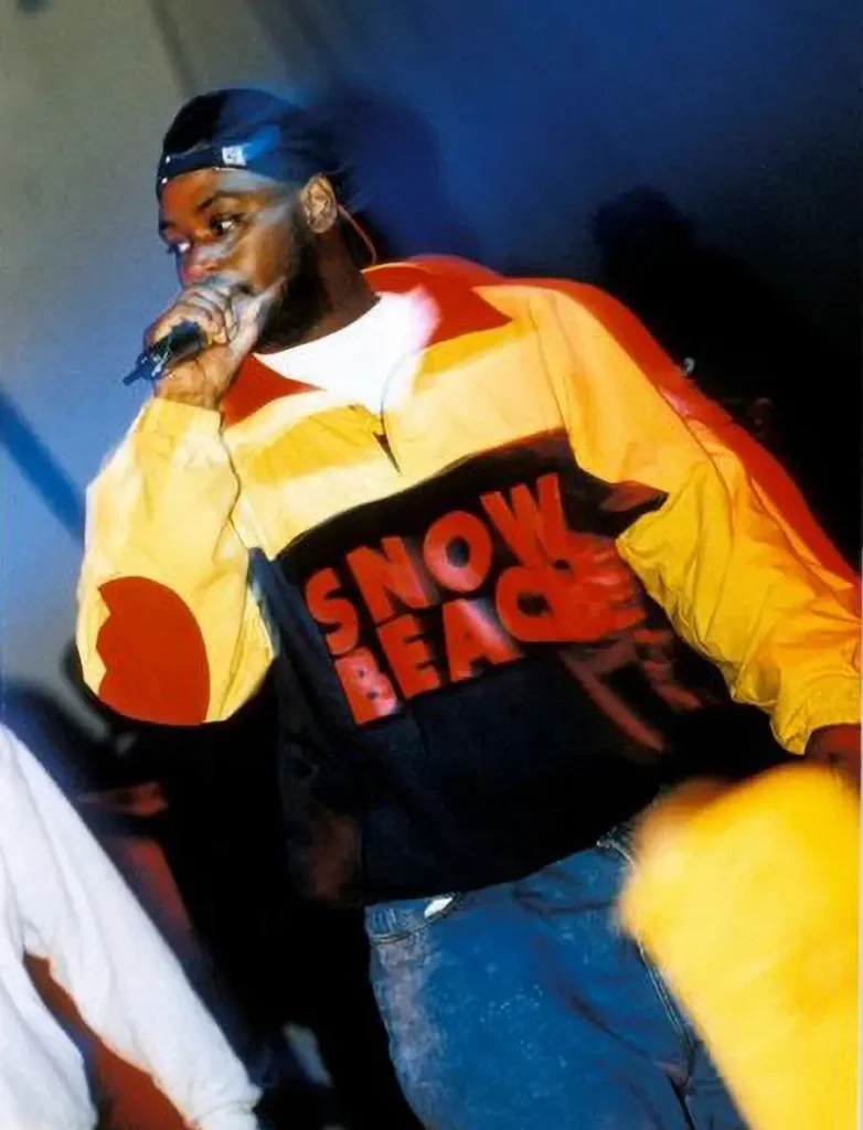 Ghostface Killah performing live wearing the iconic Polo Snow Beach jacket that became a defining symbol of Wu-Tang Clan streetwear culture.