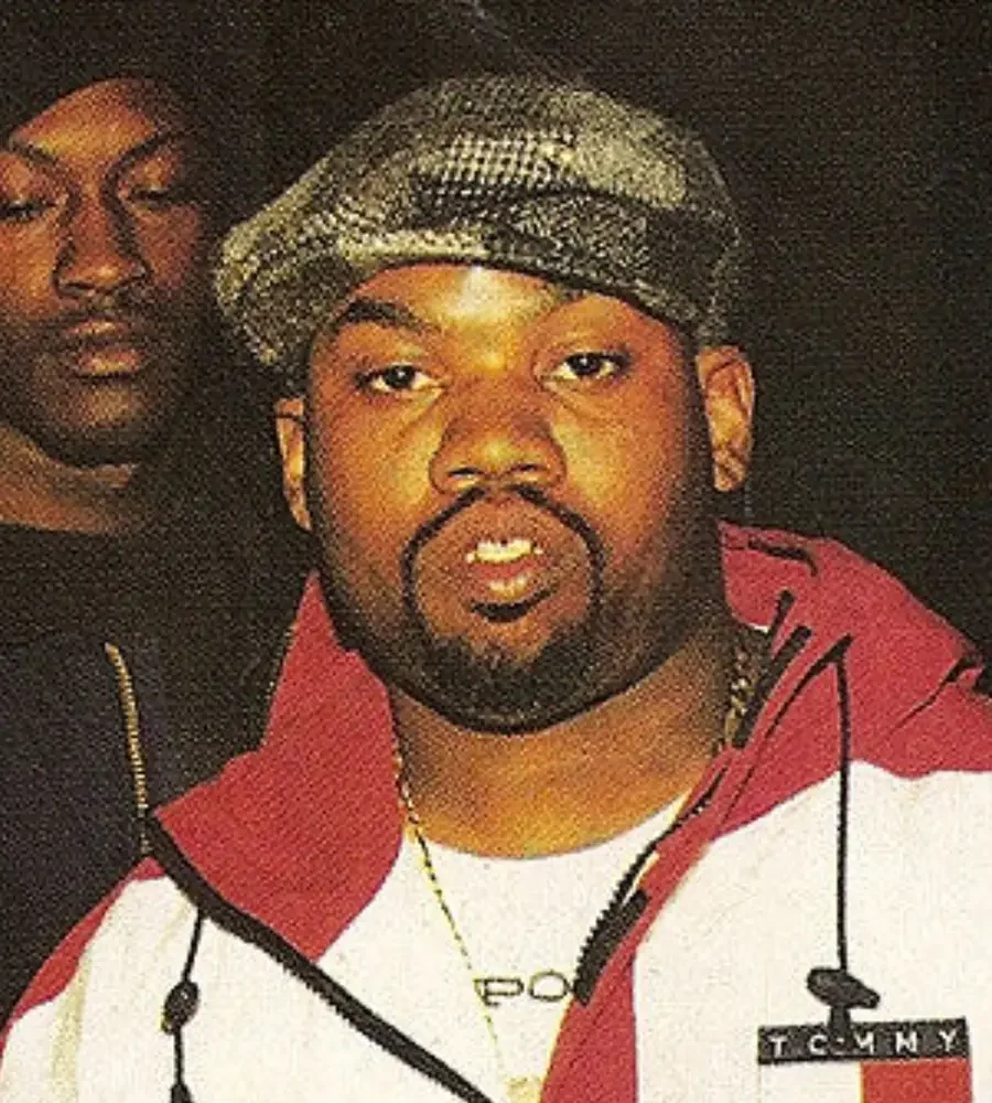 Raekwon wearing vintage Tommy Hilfiger jacket, symbolizing how Wu-Tang transformed preppy fashion into hip hop streetwear.