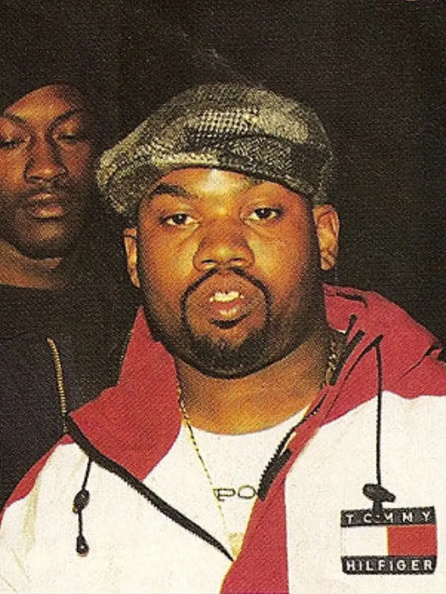 Raekwon wearing vintage Tommy Hilfiger jacket, symbolizing how Wu-Tang transformed preppy fashion into hip hop streetwear.