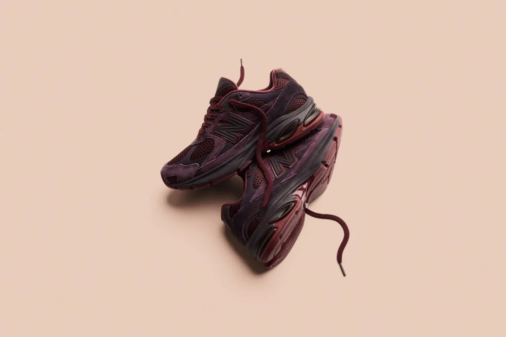 Rich Paul x New Balance Abzorb 2010 Unbothered sneakers stacked in studio lifestyle shot