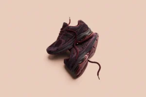 Rich Paul x New Balance Abzorb 2010 Unbothered sneakers stacked in studio lifestyle shot