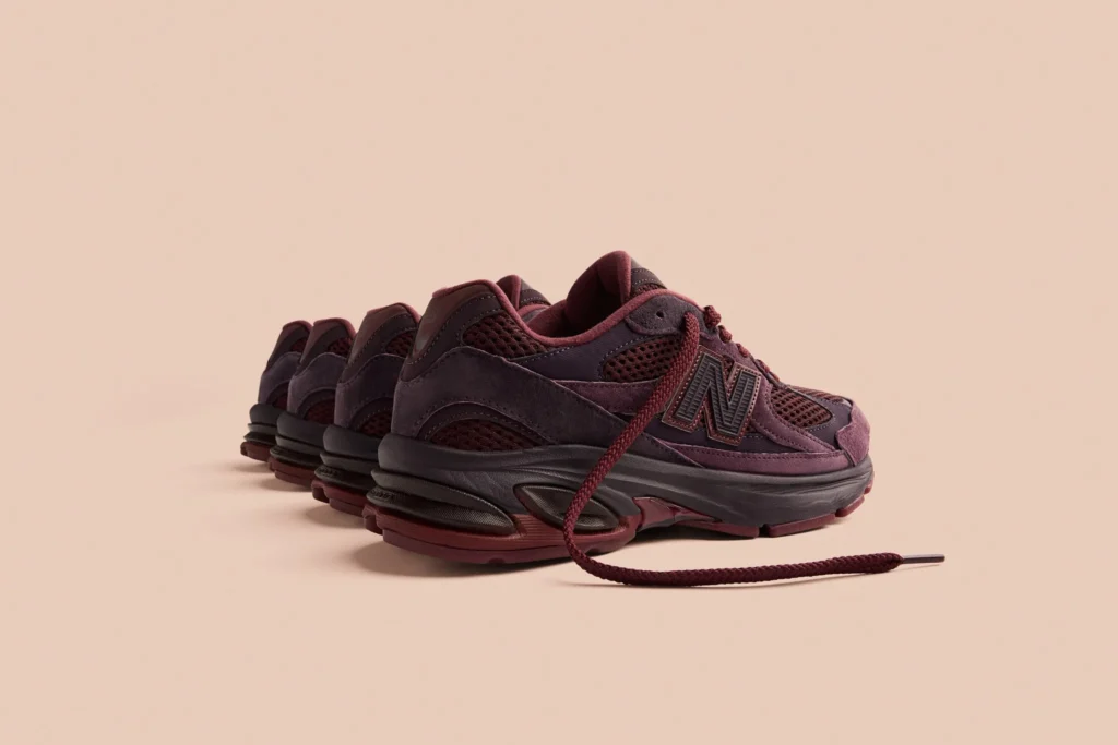 Side view lineup of Rich Paul x New Balance Abzorb 2010 Unbothered sneakers in Plum Brown
