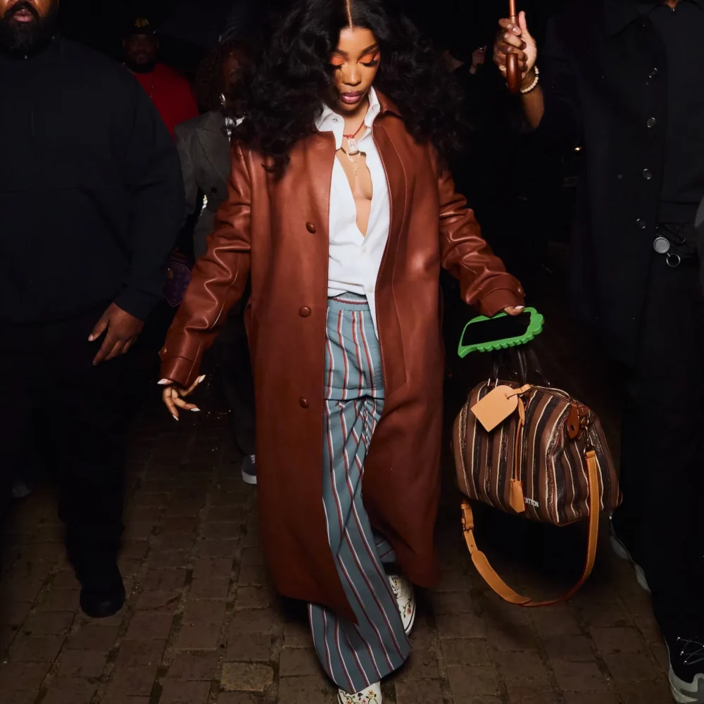 SZA arriving at Louis Vuitton men’s fashion show in Paris wearing custom Vans sneakers
