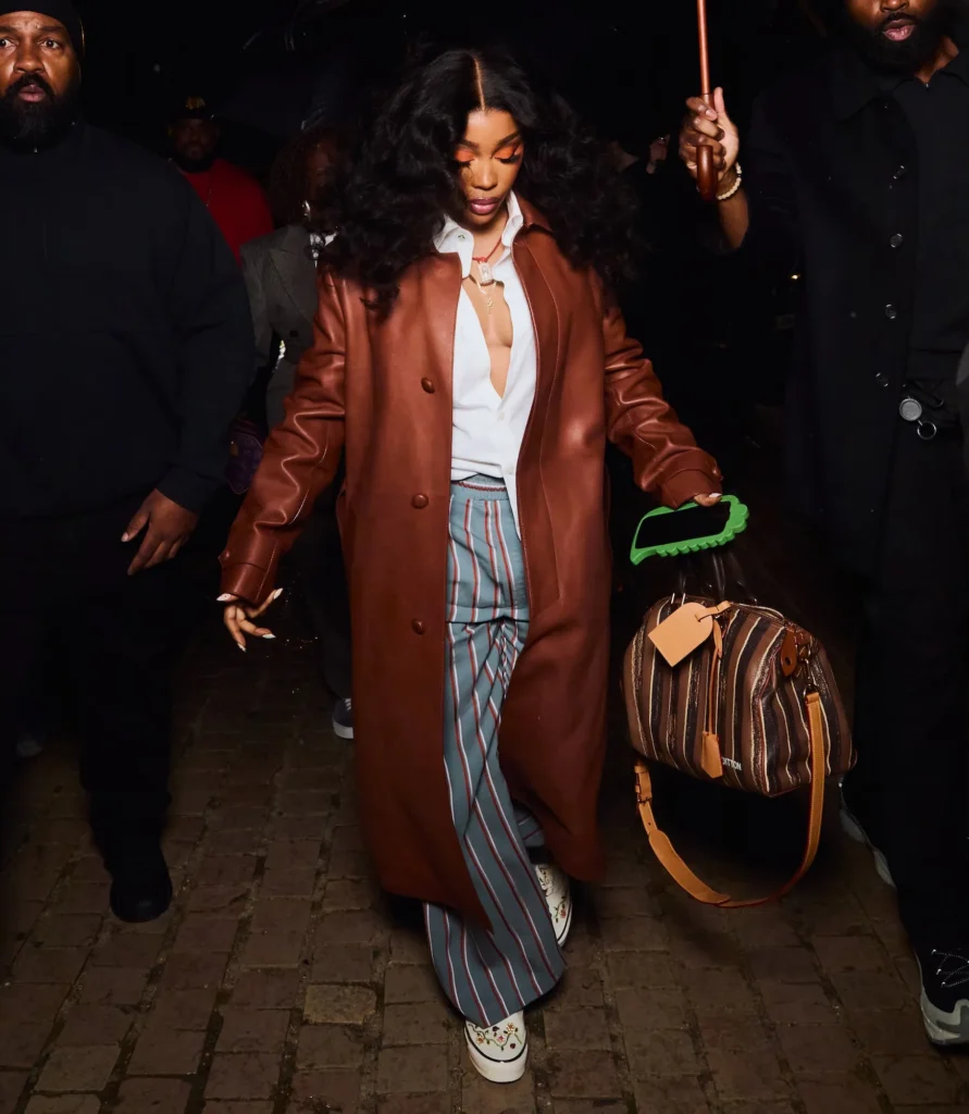 SZA arriving at Louis Vuitton men’s fashion show in Paris wearing custom Vans sneakers