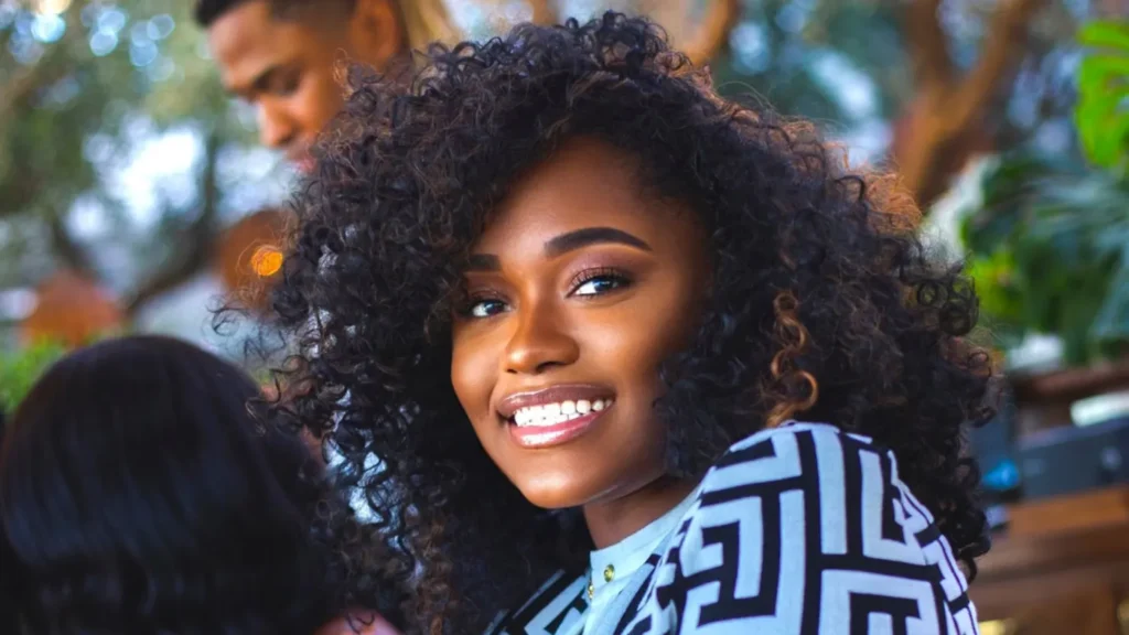 Tiffany James smiling during a ModernBlkGirl community event.